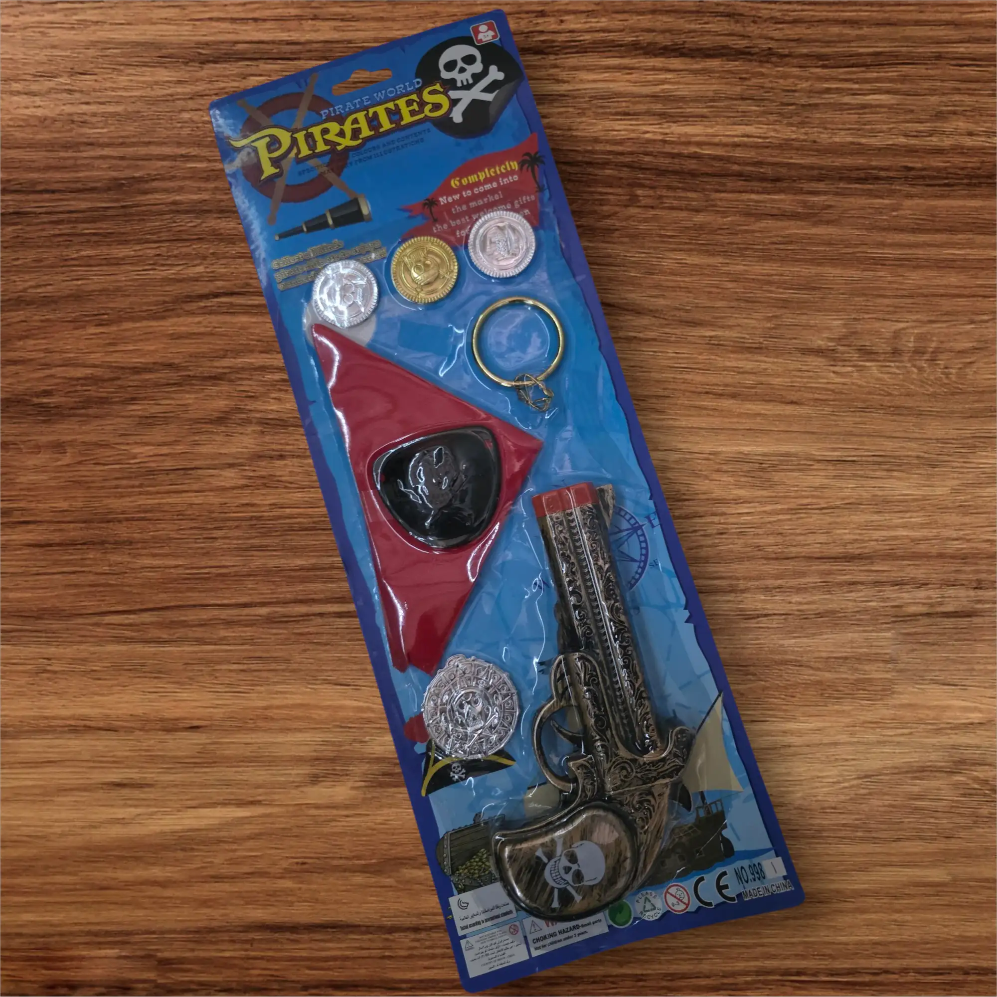 Set accessoires pirate pistolet doré 8pcs